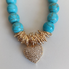 KADIN KALP TAŞLI GOLD DETAYLI ÇELİK TASARIM KOLYE